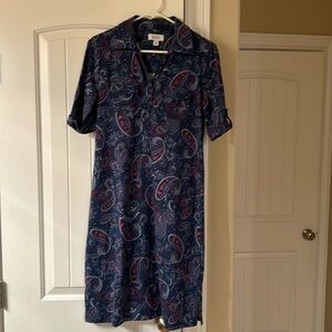 Midi length short sleeve t-shirt dress with breast pocket and cuffs